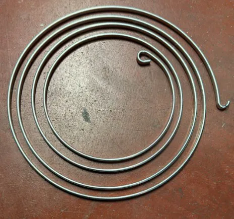 Molla ritorno movimento tamburo Mini 60S/MAXI 120 - codice 10636